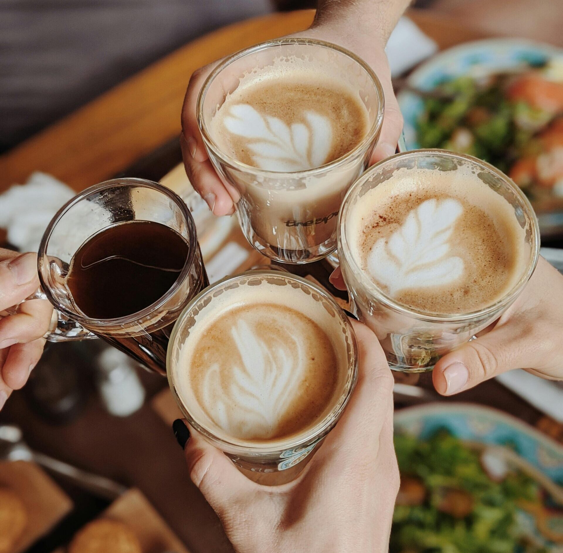 Enjoying delicious coffee with friends, perfect morning moment.